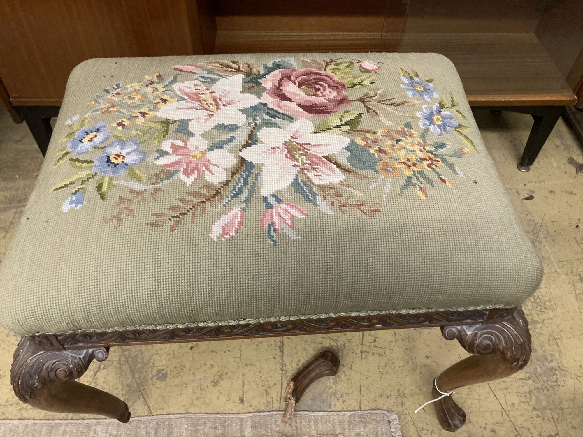 A George III style floral tapestry upholstered rectangular topped mahogany dressing stool, in the manner of George III, length 62cm, de